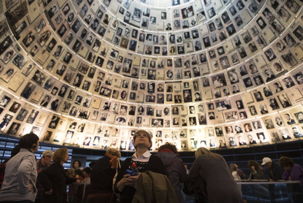 Israelis visit the Hall of Names at the Yad Vashem Holocaust museum on January 27, 2014 in Jerusalem, Israel. (Uriel Sinai/Getty Images)