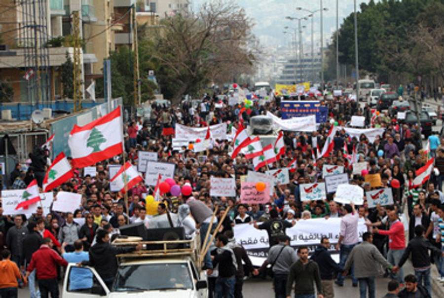 Lebanese secularists march over the weekend.(Anwar Amro/AFP/Getty Images))
