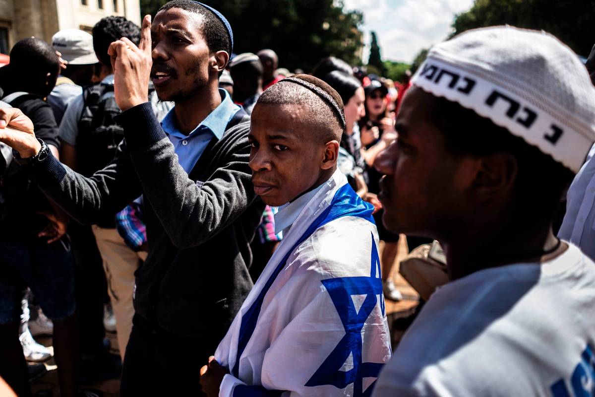 A group of Christian Zionists belonging to the Impact for Christ Ministry South Africa face off with pro-Palestinian activists during a gathering at the Israeli Apartheid Week 2017 event at the Witwatersrand University (Photo: Marco Longari/AFP/Getty Images)