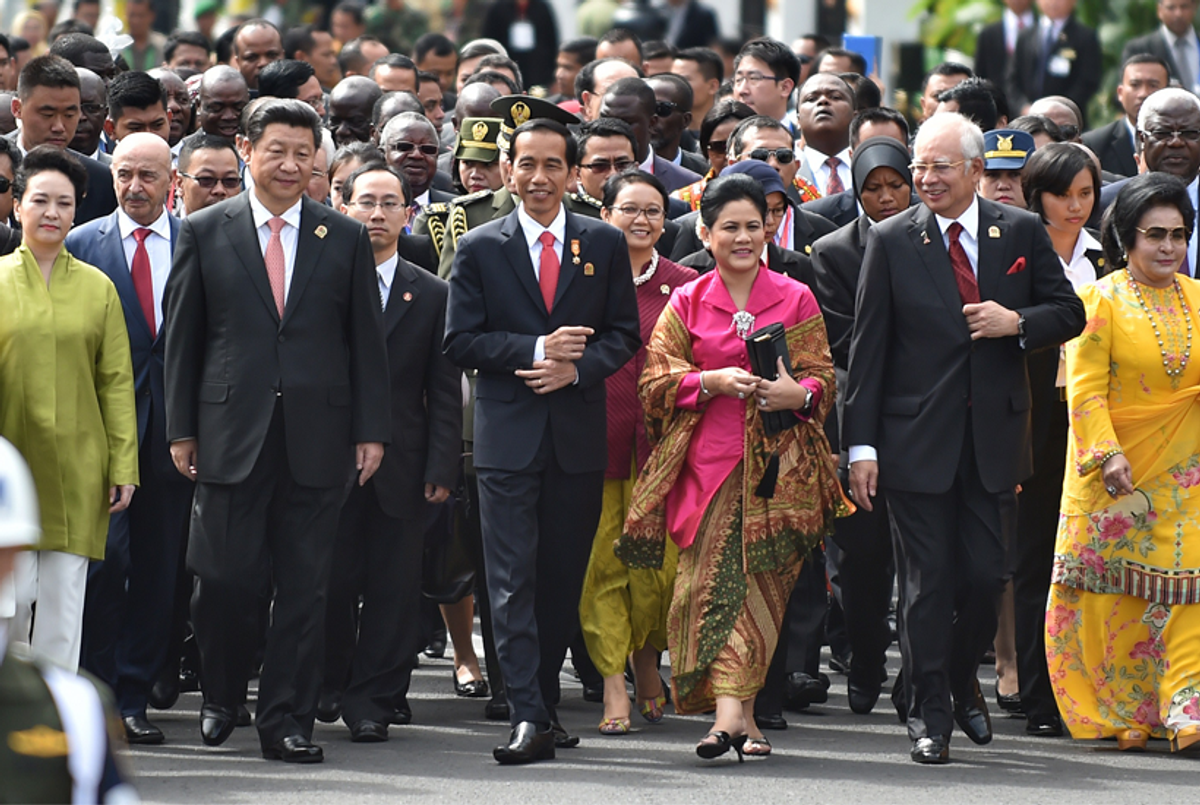 Marching back to Bandung: China's Xi Jinping, Indonesia's Joko Widodo, and Malaysia's Najib Razak, during ceremonies marking the 60th anniversary of the Asian-African Conference, Java, April 24, 2015.(Bay Ismoyo/AFP/Getty Images)