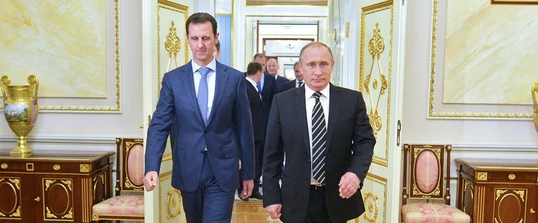 Vladimir Putin and Bashar al-Assad in Moscow, Russia, October 20, 2015. 