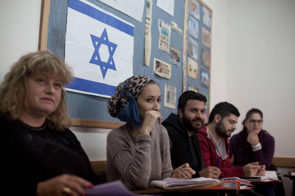 Newly arrived immigrants from France study Hebrew at ulpan on March 12, 2015, in Netanya, Israel