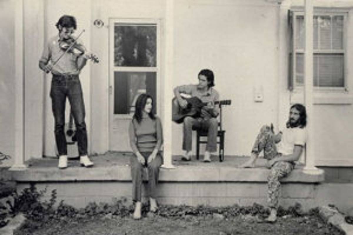Antopolsky (far right) and Townes Van Zandt (far left) with fellow musicians. (Photo: Palm Pictures)