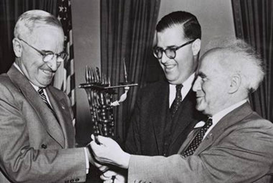 David Ben Gurion and Abba Eban present Harry Truman with a menorah, 1951.