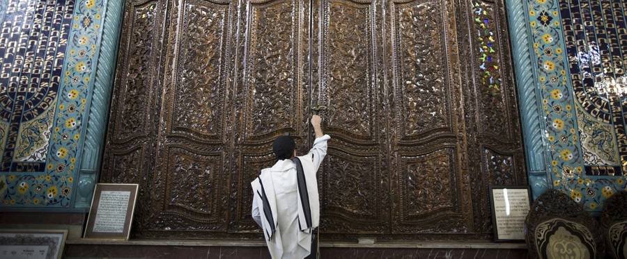 Closing the ark during morning prayers at Youssef Abad Synagogue in Tehran on Sept. 30, 2013.