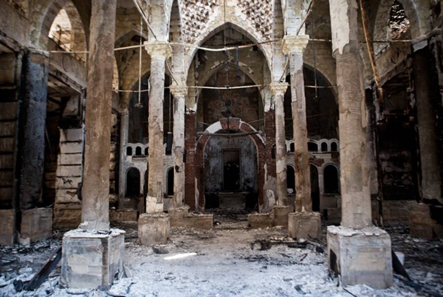 A picture taken on August 18, 2013 shows the Amir Tadros coptic Church in Minya, some 250 kms south of Cairo, which was set ablaze on August 14, 2013. (VIRGINIE NGUYEN HOANG/AFP/Getty Images)