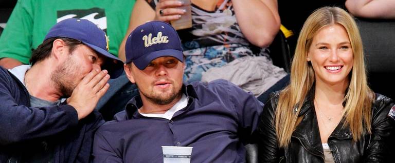 Bar Refaeli (R) and Leonardo DiCaprio attend a game between the Oklahoma City Thunder and the Los Angeles Lakers at the Staples Center in Los Angeles, California, April 27, 2010.  