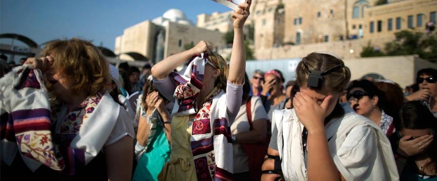 Members of Women of the Wall pray at the plaza near the Western Wall in Jerusalem's Old City, July 8, 2013. 