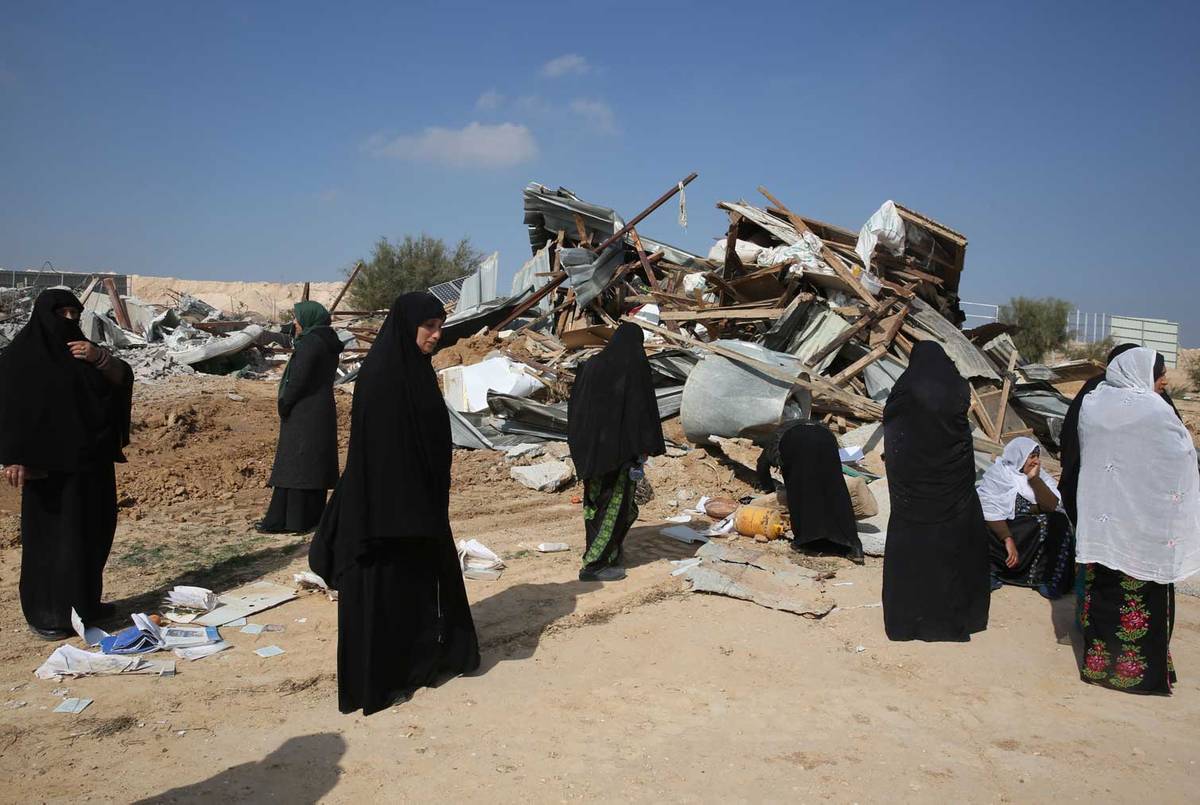 Bedouin women react to the destruction of houses on January 18, 2017 in the Bedouin village of Umm al-Hiran. (Photo: Menahem Kahana/AFP/Getty Images)