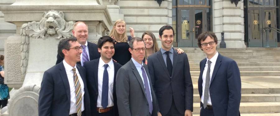 The Southern Poverty Law Center legal team poses in front of the courthouse after the verdict was handed down by a jury, ruling in favor of their clients (plaintiffs)