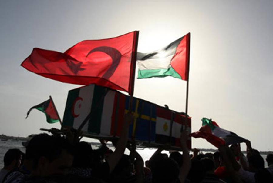 The Turkish and Palestinian flags wave at a protest.(Mahmud Hams/AFP/Getty Images)