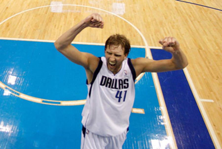 Dirk, victorious.(Eric Gay-Pool/Getty Images)