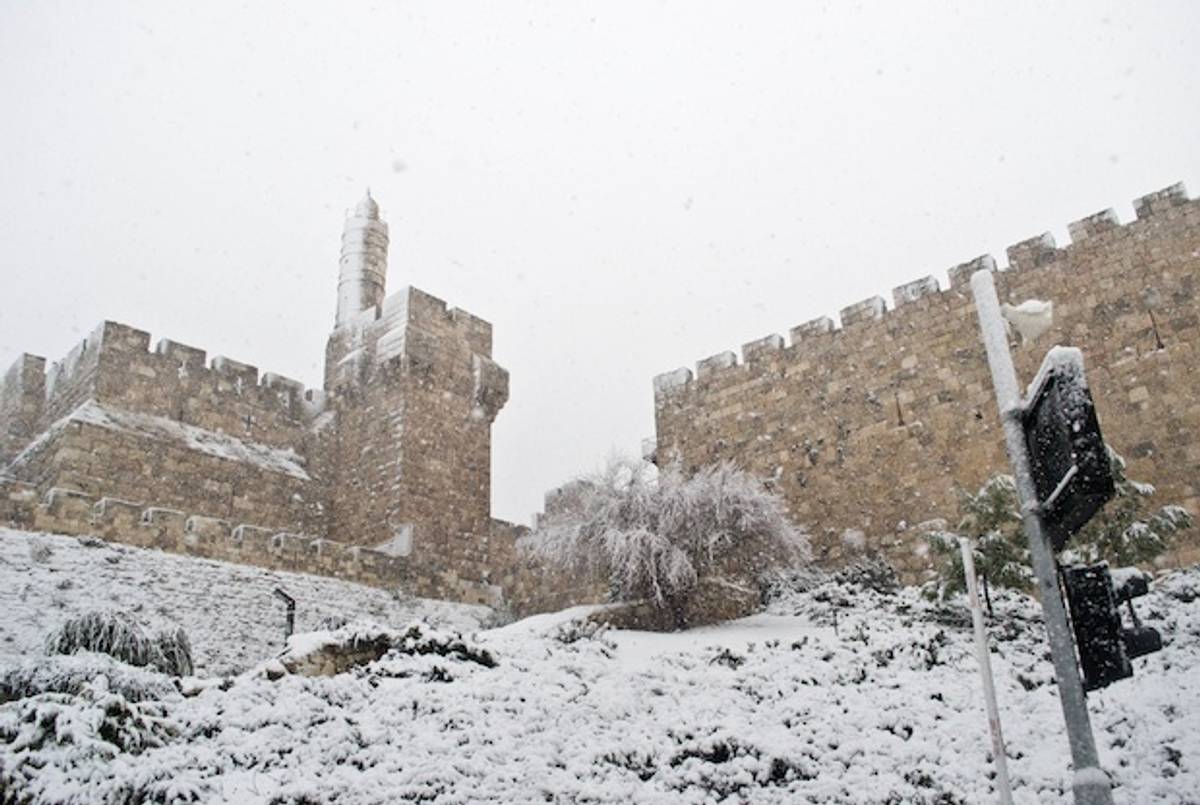 Snow Blankets Jerusalem's Old City on Thursday, December 12, 2013.(Yaniv Salama--Scheer)