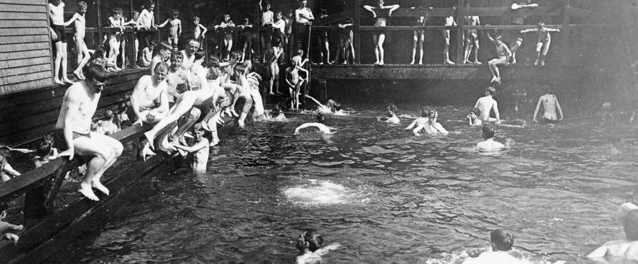 City children bathing for free at the Battery, New York City, c. 1908.