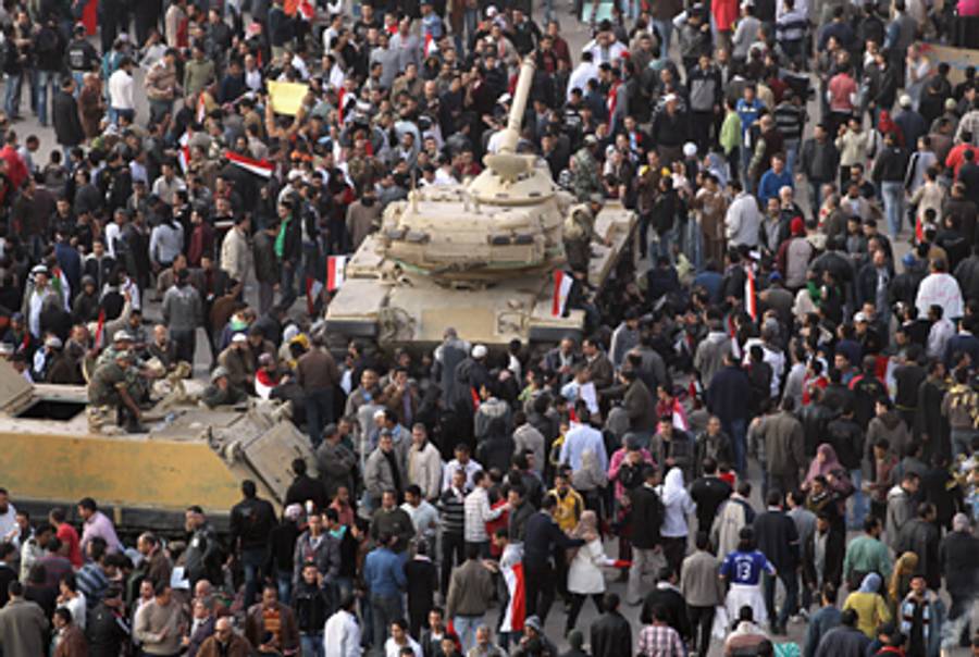 Anti-government protesters in Tahrir Square today.(John Moore/Getty Images)