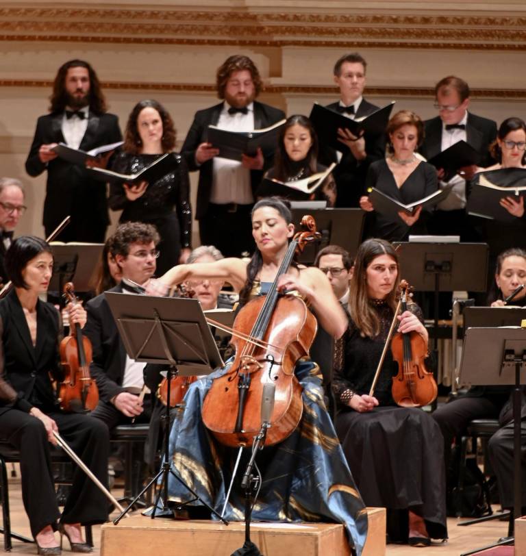 Japanese American cellist Kristina Reiko Cooper, at center, plays a symphony together with the New York City Opera orchestra at New York’s Carnegie Hall on April 19, 2023, in honor of wartime Japanese diplomat Chiune Sugihara. He disregarded the orders of his superiors and issued visas in 1940 to help Jewish refugees escape Nazi persecution as the acting consul in Kaunas, Lithuania.