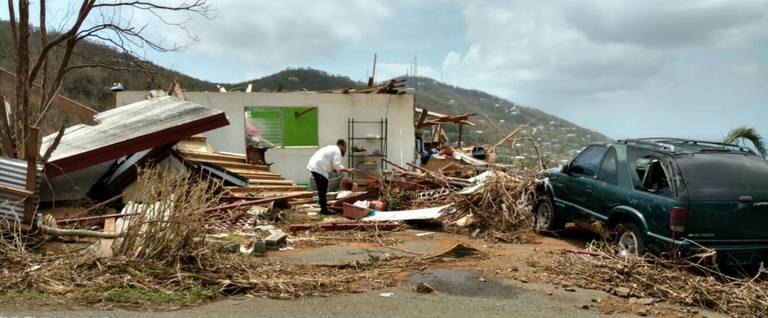 The author surveying the damage on St. Thomas after Hurricanes Irma and Maria