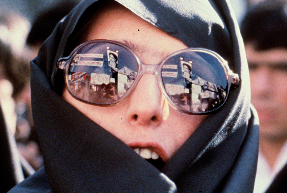 Tehran, 1979: An Iranian woman demonstrates outside of the U.S. Embassy.(Staff/AFP/Getty Images)