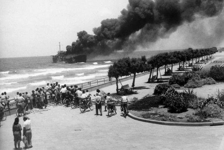 The Altalena on fire off the coast of Tel Aviv, June 22, 1948.(Hans Pinn/Government Press Office, State of Israel)