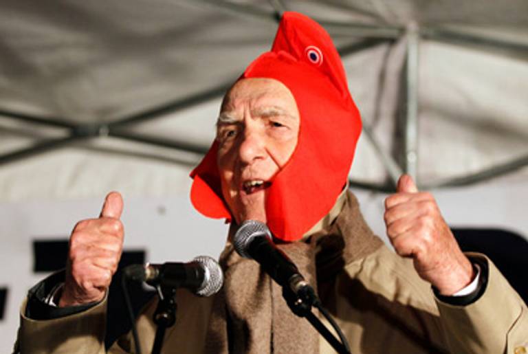 Stéphane Hessel at a pro-Palestinian rally. His hat is an homage to the French Revolution.(Charles Platiau/Reuters/NYT)