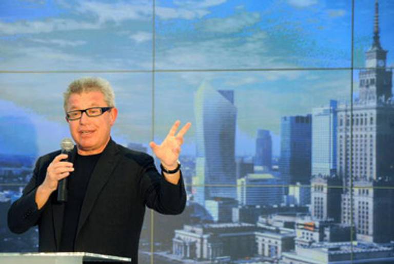 Libeskind in front of an image of downtown Warsaw, including a proposed residential tower he designed, last year.(AFP/Getty Images)