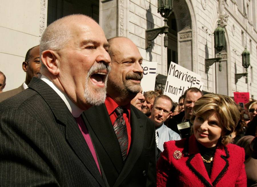 The Rev. Troy Perry, at left, and his husband, Phillip Ray De Blieck, speak to reporters following a hearing on gay marriage at the California Supreme Court in San Francisco, March 4, 2008