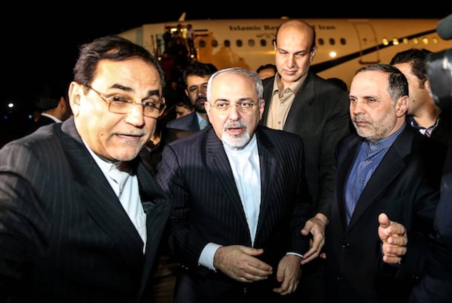 Iranian Foreign Minister Mohammad Javad Zarif (C) arriving at Tehran's Mehrabad Airport after talks in Geneva in which world powers reached an agreement with Iran over its nuclear program on November 24, 2013. (ARASH KHAMOOSHI/AFP/Getty Images)