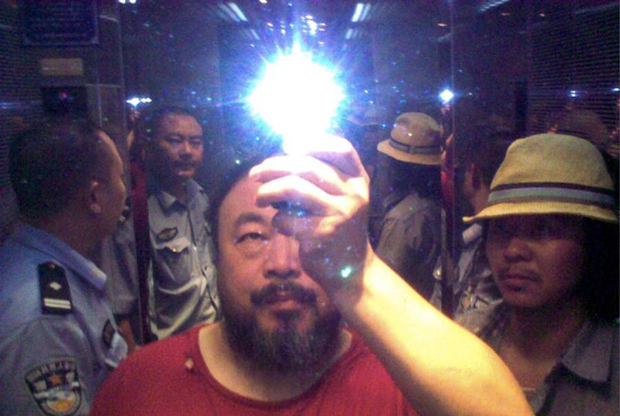 Ai Weiwei with rockstar Zuoxiao Zuzhou in the elevator when taken in custody by the police, Sichuan, China, August 2009.(Courtesy the artist and Christine König Galerie, Vienna)