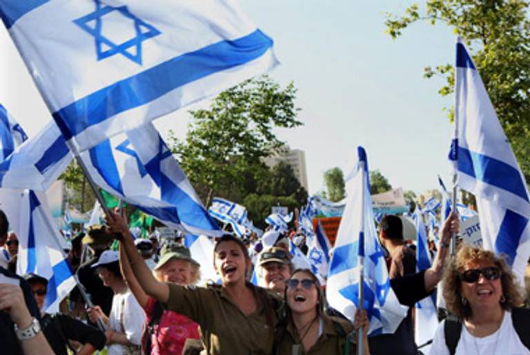 Rural Israeli youths march in solidarity today.(Gali Tibbon/AFP/Getty Images)