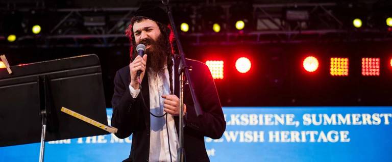 Shlomo Gaisin of Zusha performing in Central Park, June 14, 2017.
