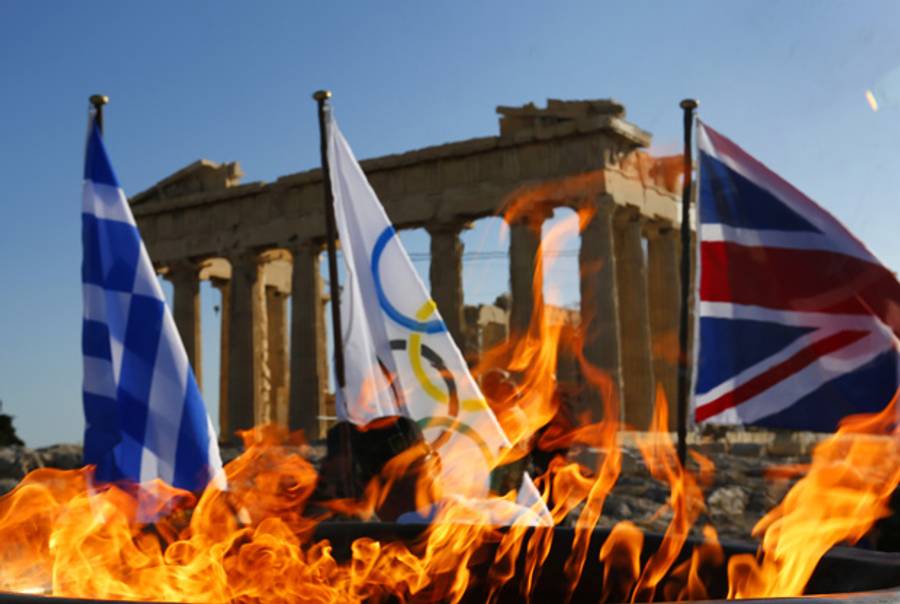 The cauldron with the Olympic Flame at the Acropolis in Athens, Greece.(YANNIS BEHRAKIS/AFP/GettyImages)