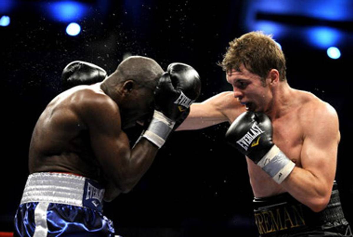 Yuri Foreman (right) lands a punch on Vinroy Barrett of Kingston, Jamaica in an October 2008 bout.(Jeff Zelevansky/Getty Images)