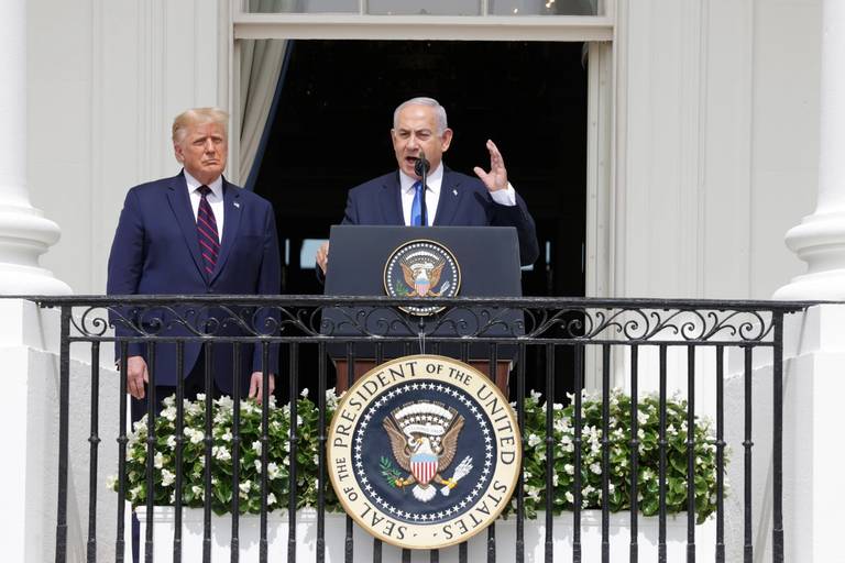 Prime Minister of Israel Benjamin Netanyahu speaks as U.S. President Donald Trump looks on during the signing ceremony of the Abraham Accords on the South Lawn of the White House, Sept. 15, 2020, in Washington, D.C.