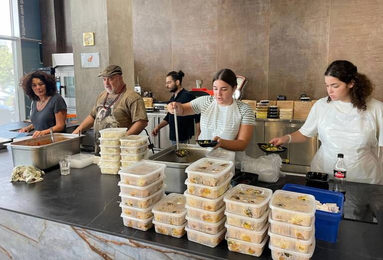 Volunteers at Attilio, a cooking school in Or Yehuda, which has pivoted to cooking and distributing meals for anyone affected by the war
