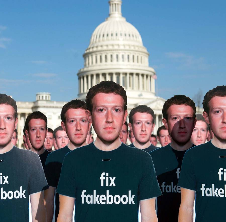 One hundred cardboard cutouts of Facebook founder and CEO Mark Zuckerberg stand outside the U.S. Capitol in Washington, D.C., April 10, 2018