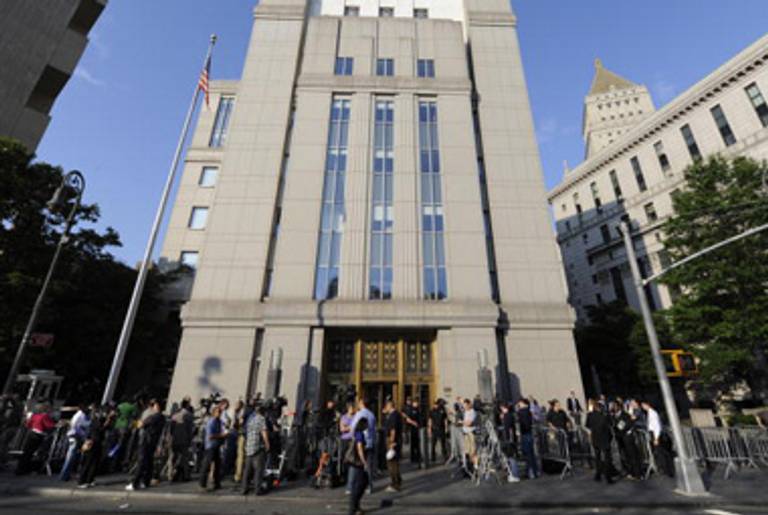 Media gather in the front of United States Courthouse in New York June 29, 2009 for the sentencing of disgraced financier Bernard Madoff(TIMOTHY A. CLARY/AFP/Getty Images)