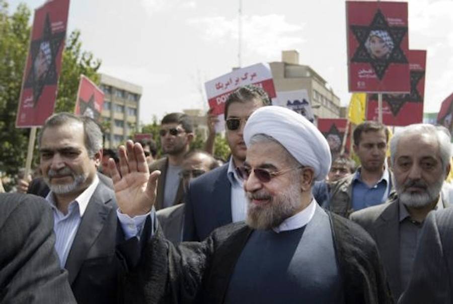 Iran's newly elected president Hassan Rouhani (C) attends a Jerusalem Day (al-Quds Day) rally on August 2, 2013 in Tehran, Iran.(UPI/Maryam Rahmanian)