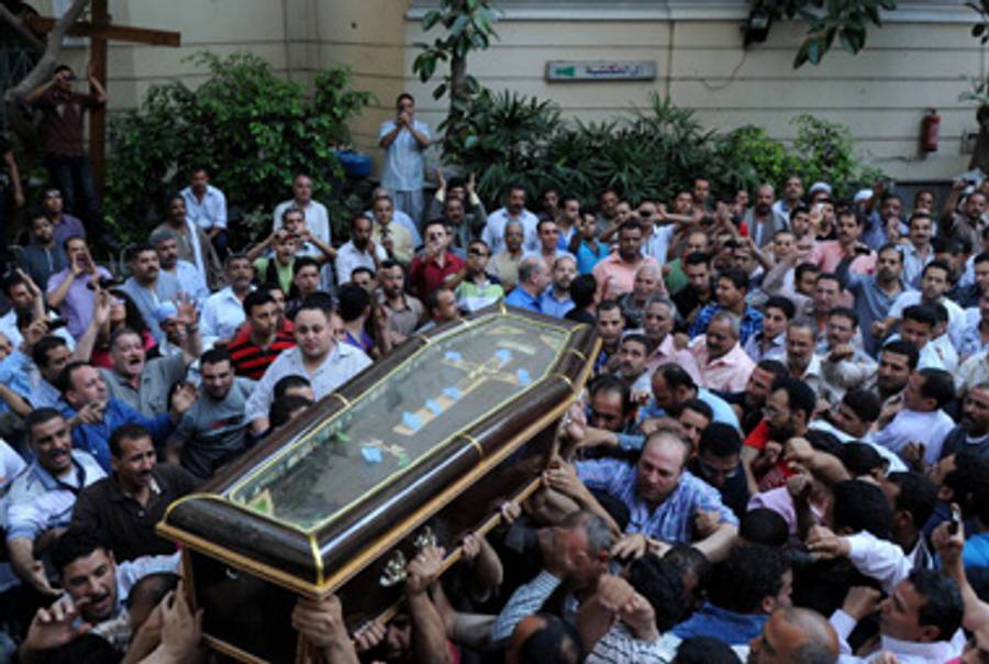 A funeral for a Coptic Christian victim of the violence.(-/AFP/Getty Images)
