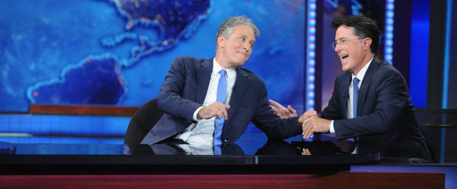 Stephen Colbert and Jon Stewart appear on 'The Daily Show with Jon Stewart' #JonVoyage on August 6, 2015 in New York City. 