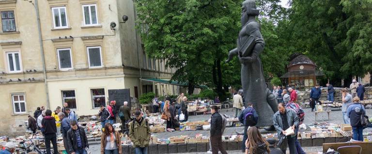 Lviv book market in front of Dormition Church.