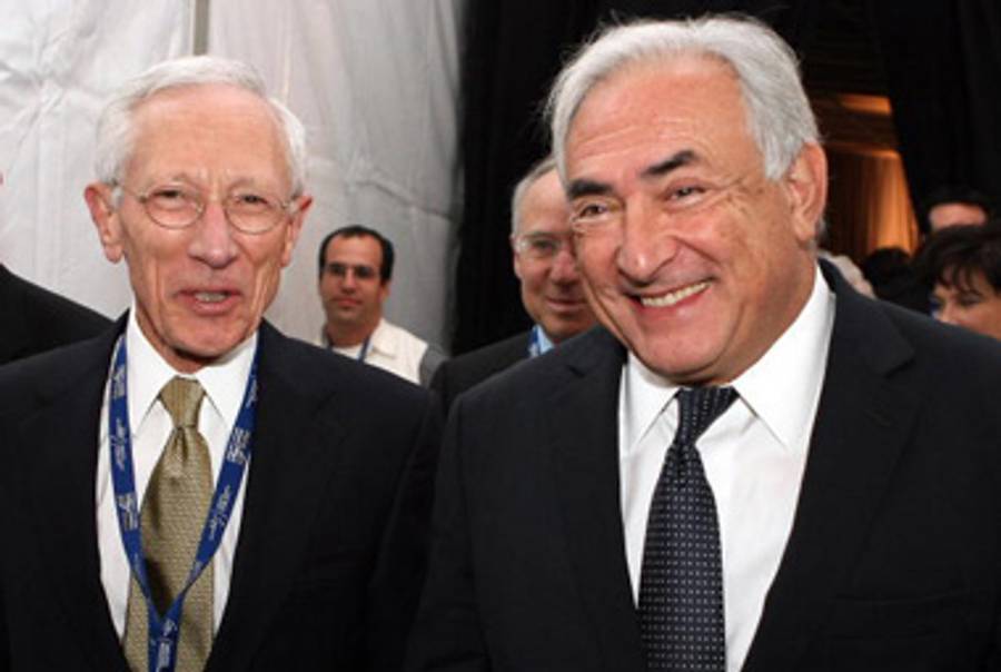Stanley Fischer (L) and Dominque Strauss-Kahn (R) in Israel last year.(Jack Guez/AFP/Getty Images)