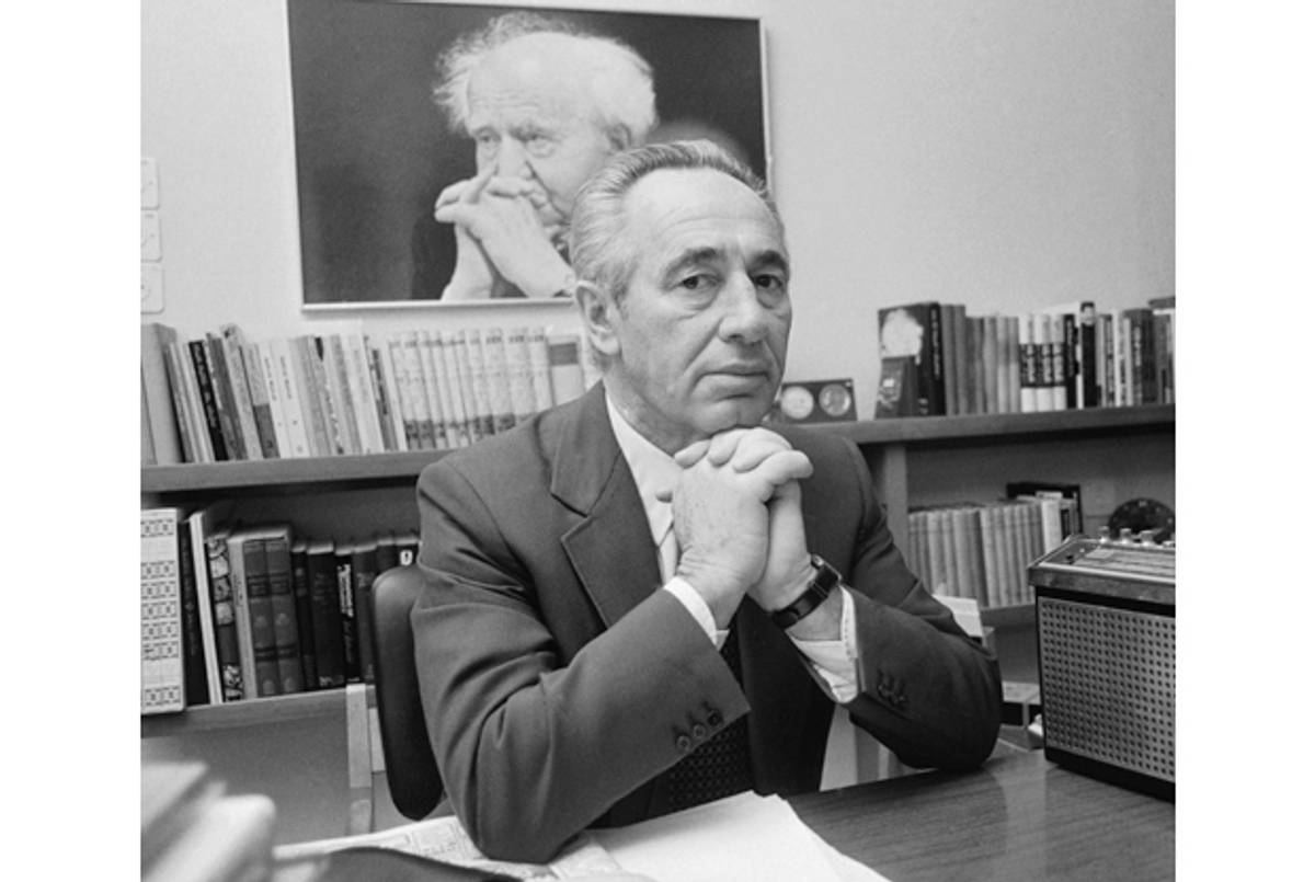 Shimon Peres in his Tel Aviv office, with a portrait of David Ben-Gurion behind him, June 1981.(Associated Press)