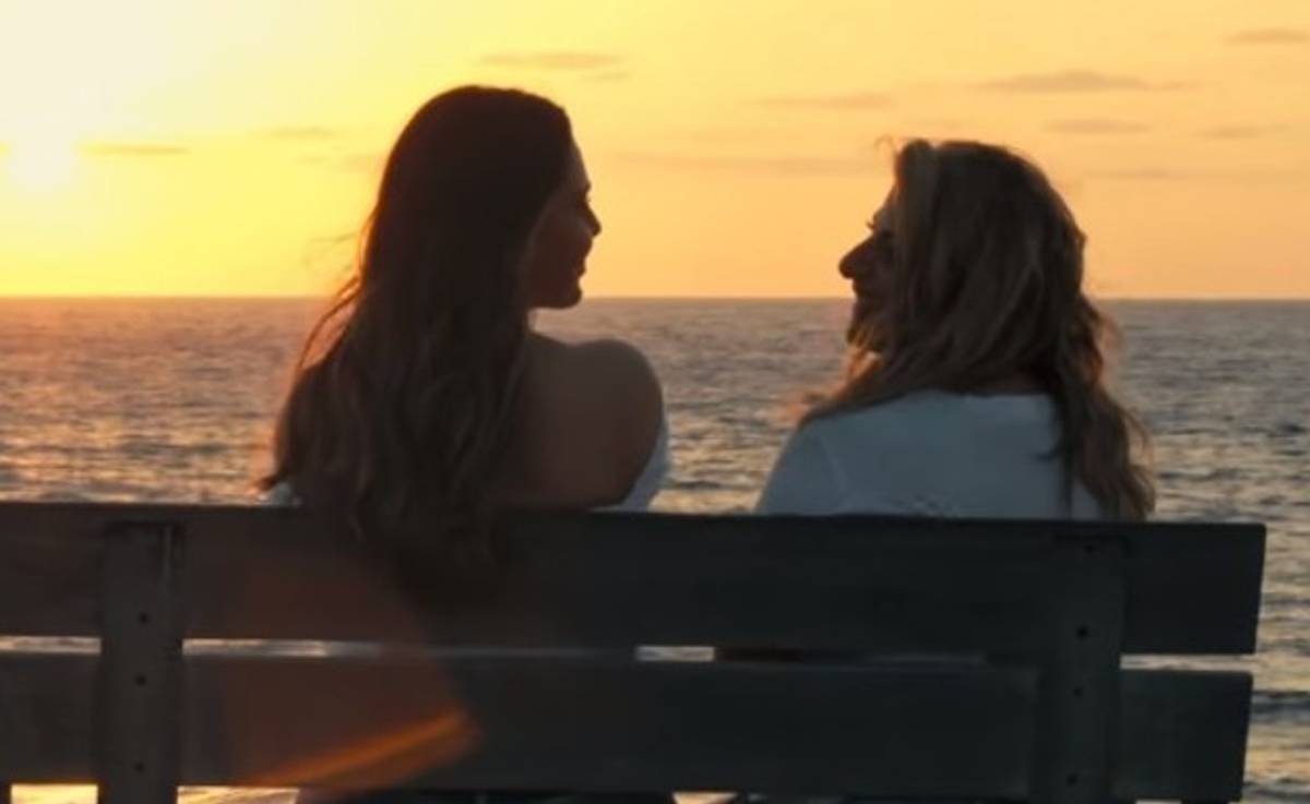 A still from the 'Ahava kmo Shelanu' video, revealing Hadad with her partner