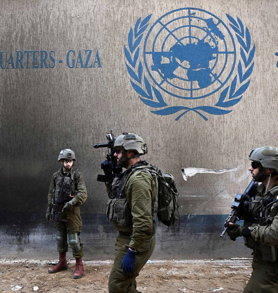 Israeli soldiers operate next to the UNRWA headquarters, where the IDF uncovered a Hamas command tunnel running underneath the U.N. compound in the Gaza Strip, Feb. 8, 2024