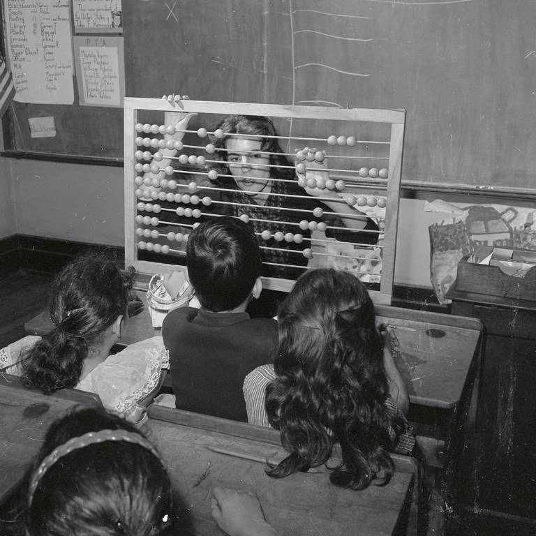 Joann Hulkower, a 21-year-old senior at Yeshiva University’s Stern College for Women in New York, teaches school children, in 1961