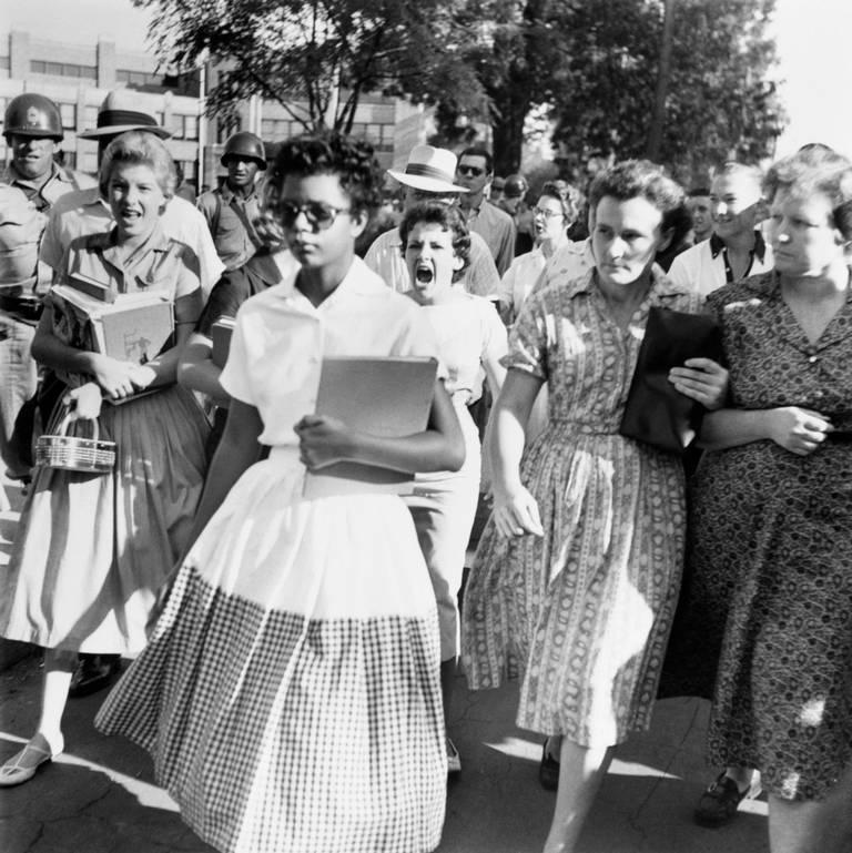 Elizabeth Eckford ignores the hostile screams and stares of fellow students on her first day of school, Sept. 6, 1957. She was one of the nine African American students whose integration into Little Rock's Central High School was ordered by a federal court following legal action by the National Association for the Advancement of Colored People.