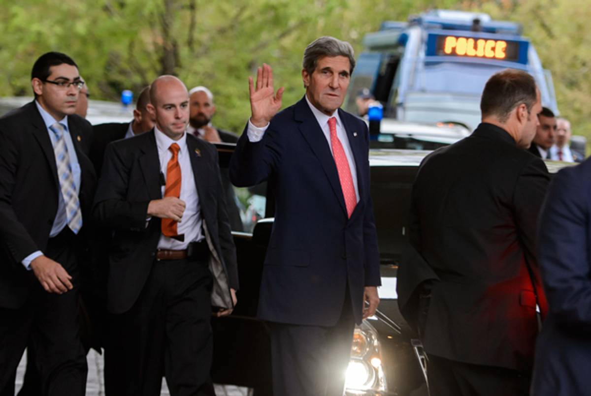 US Secretary of State John Kerry gestures upon his arrival on November 8, 2013 in Geneva on the second day of talks with Iran on nuclear program. (FABRICE COFFRINI/AFP/Getty Images)