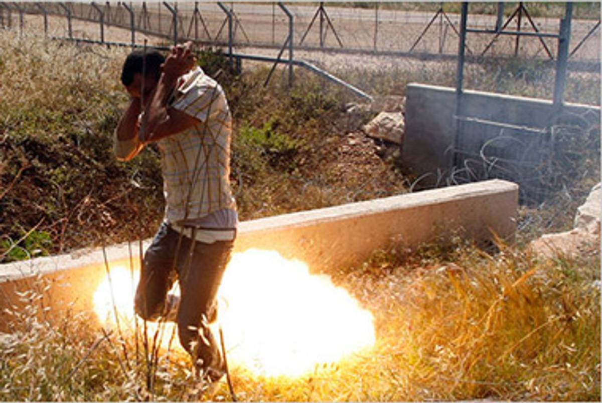 A Gazan and a stun grenade, Tuesday.(NYT)