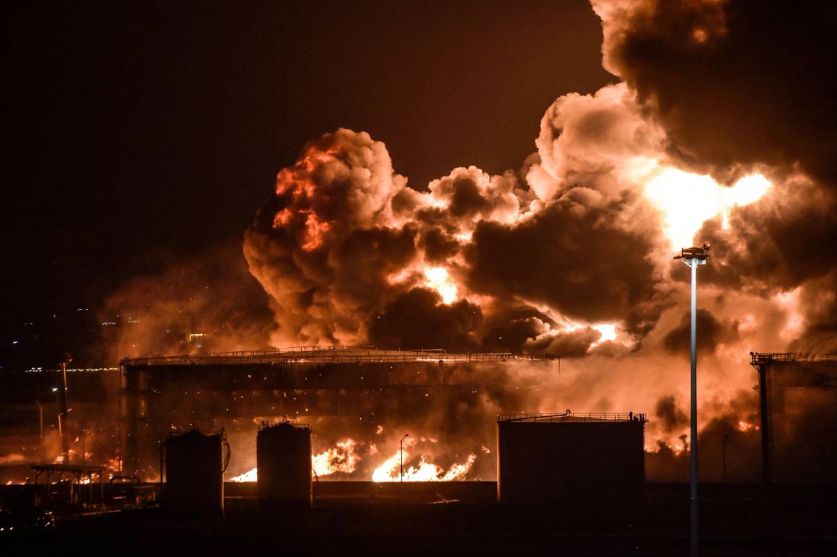 Smoke and flames rise from a Saudi Aramco oil facility in Jeddah following a Houthi attack from Yemen on March 25, 2022
