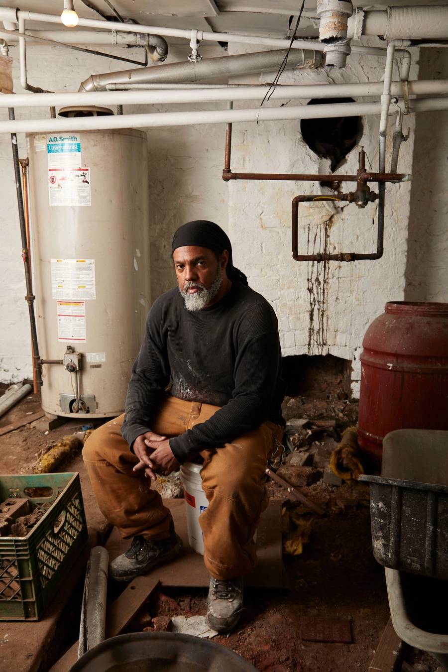 Lincoln Eccles in the boiler room of his Crown Heights building